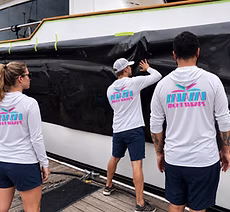 Miami Yacht Wraps Crew at Work.png